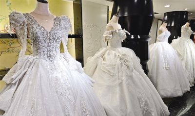 节庆旺季带热婚庆用品市场 为何只有婚纱摄影遇冷 - 图画吧TUHUABA